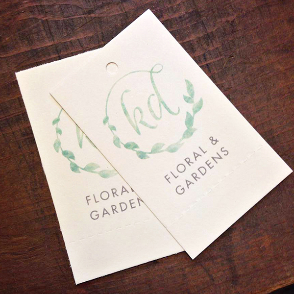 Price tags featuring KD Floral and Gardens floral wreath logo design